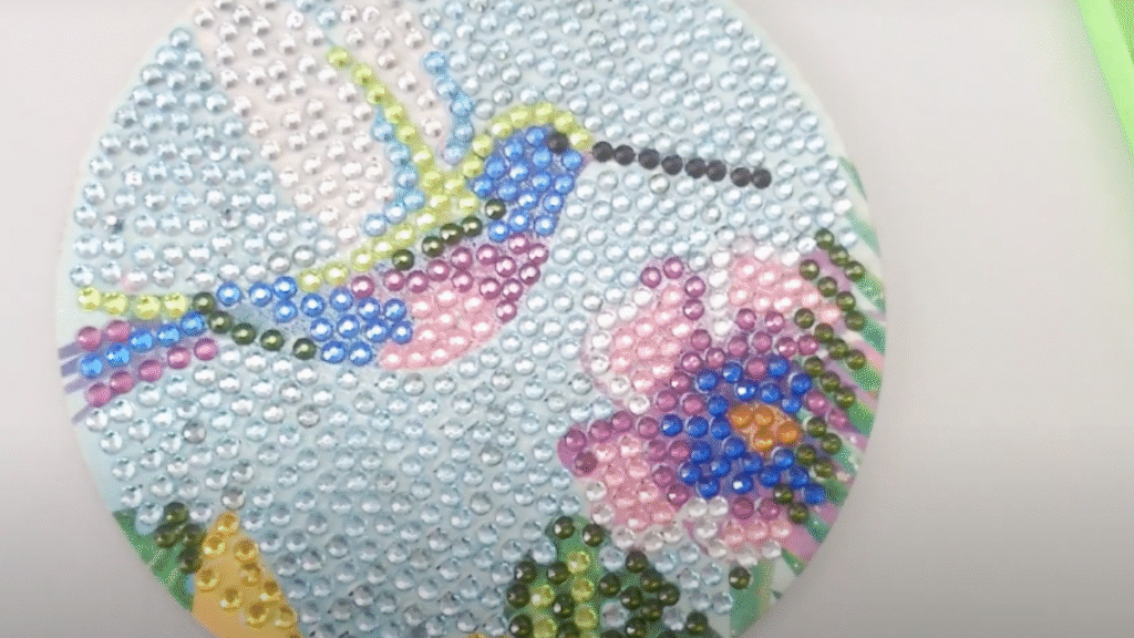 posavasos con colibri en punto de diamante