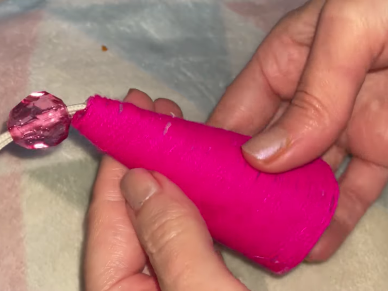 puedes ponerle un cordel